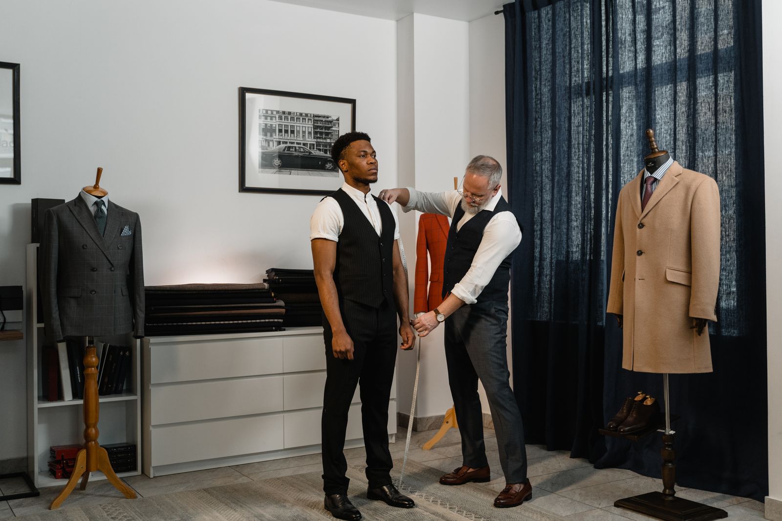 Tailor fitting a client